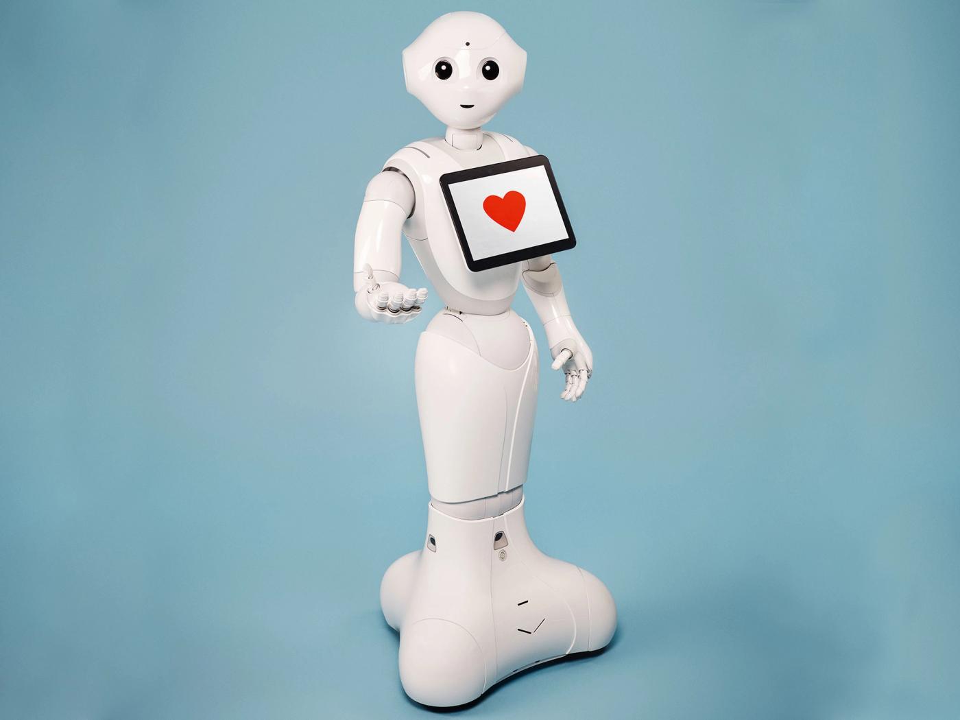 Pepper showing a heart — emotional companion for aging parents